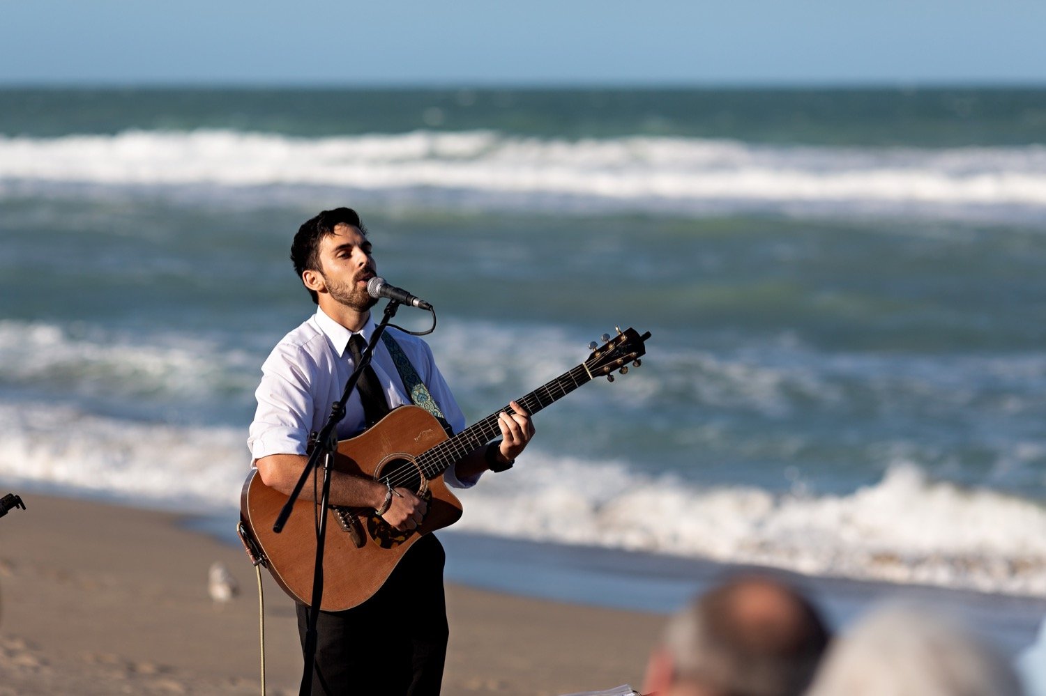 14_Jensen-Beach-Wedding-Jensen-Beach-Wedding-Photographer_0611_guitar_Jensen_and_male_wedding_beach_playing_the_singing.jpg