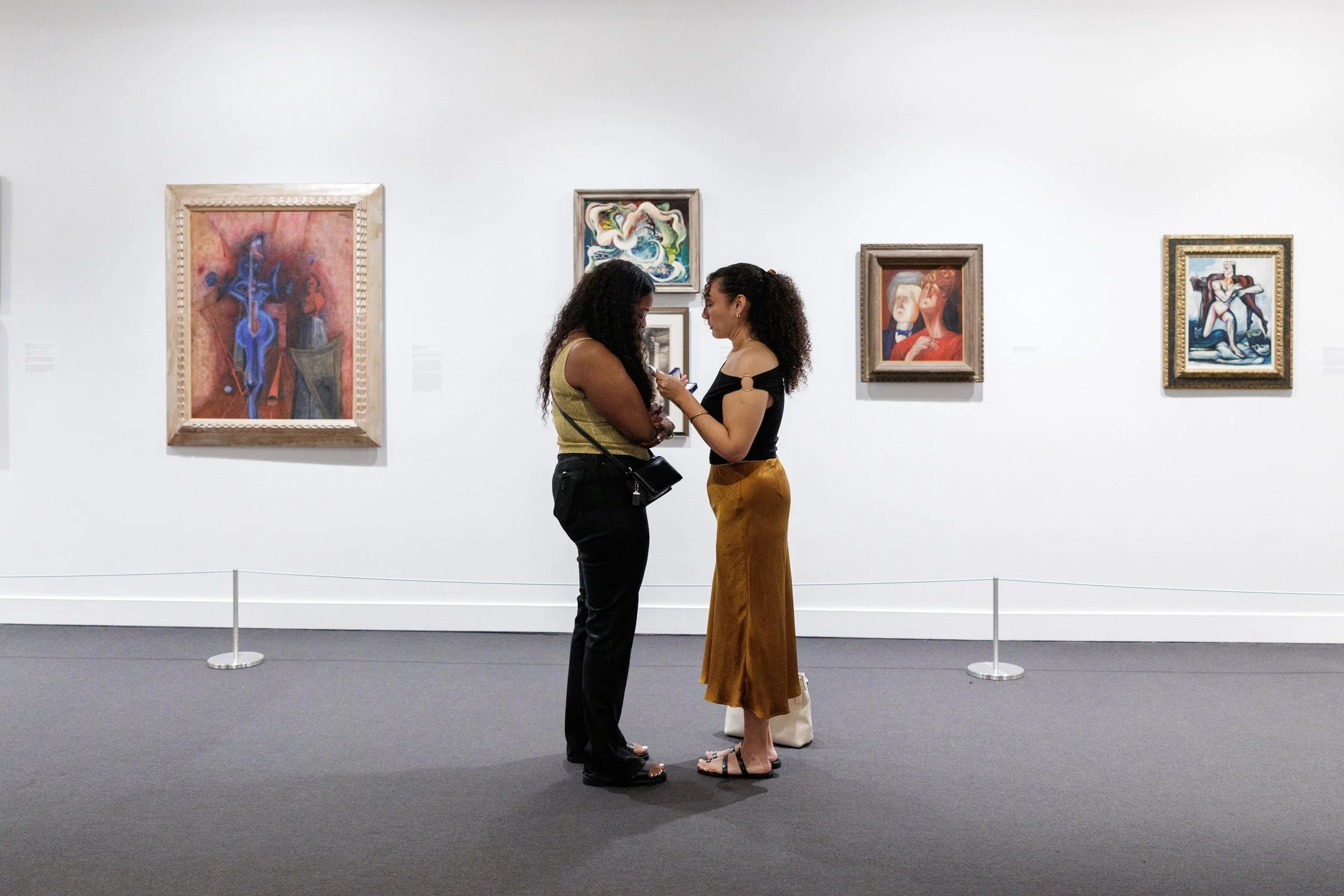 Wide gallery view showing couple after engagement at NSU Art Museum