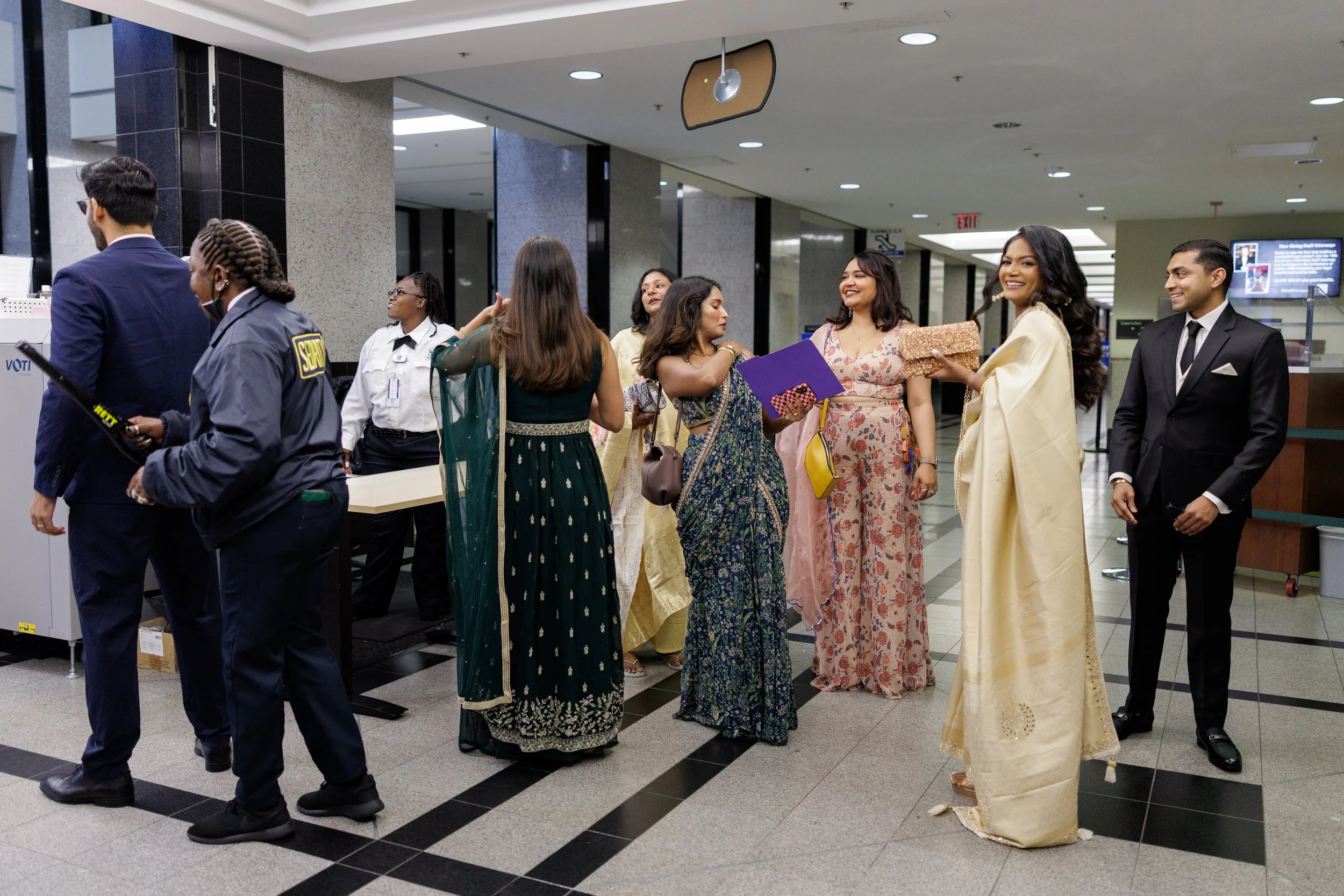 Guests gathered inside the West Palm Beach Courthouse while waiting for a courthouse wedding ceremony in South Florida