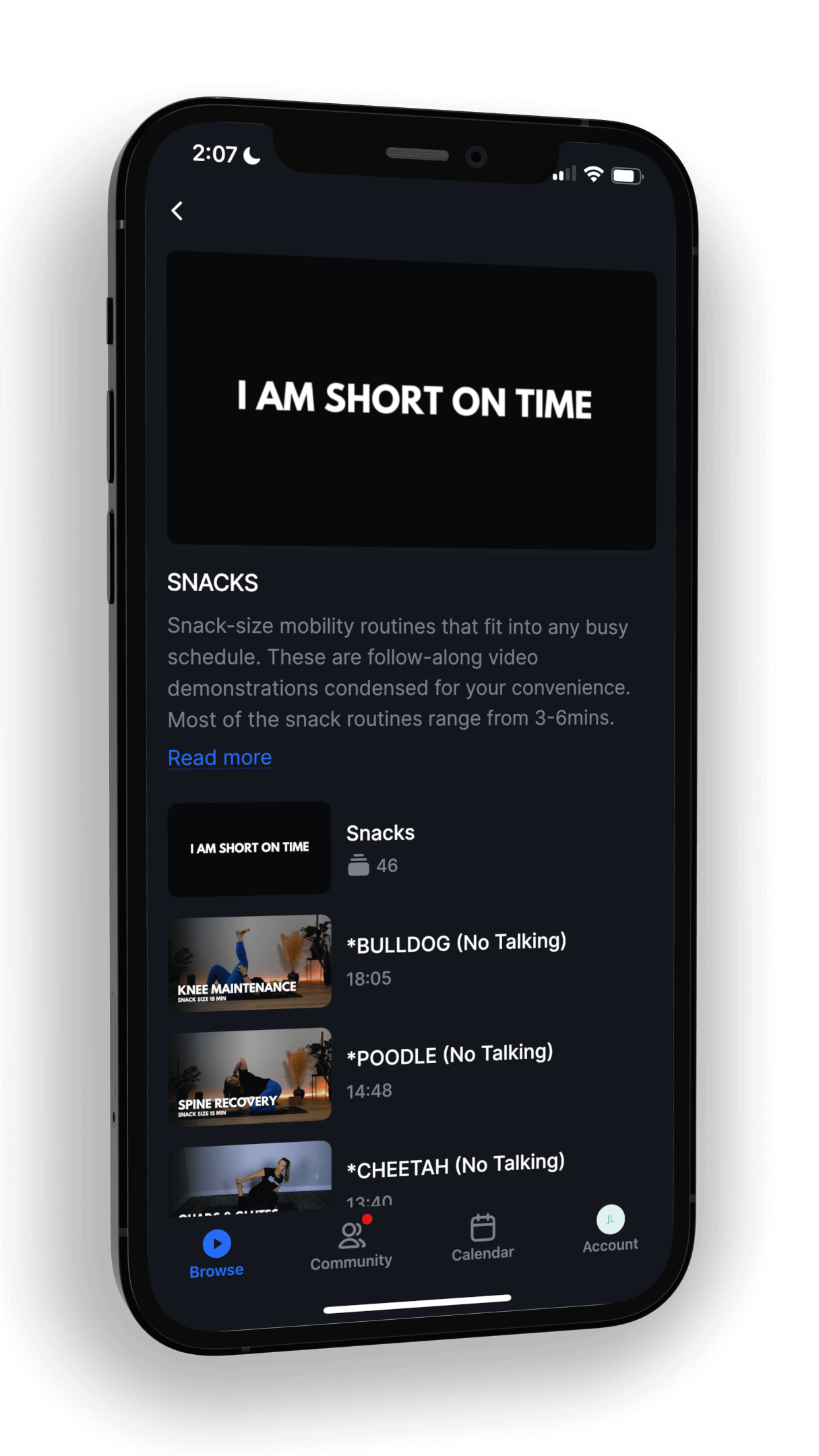 Smartphone screen displaying a fitness app with the title "I AM SHORT ON TIME" and a section titled "SNACKS" featuring video thumbnails for workout routines.
