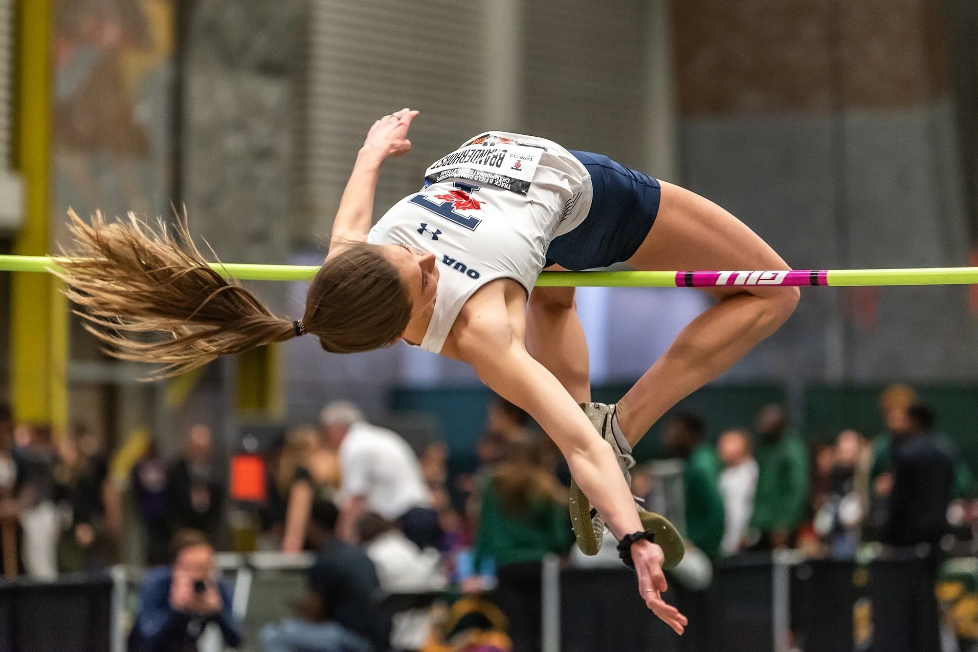 Emily Branderhorst competing in high jump. She is a physiotherapist in hamilton.