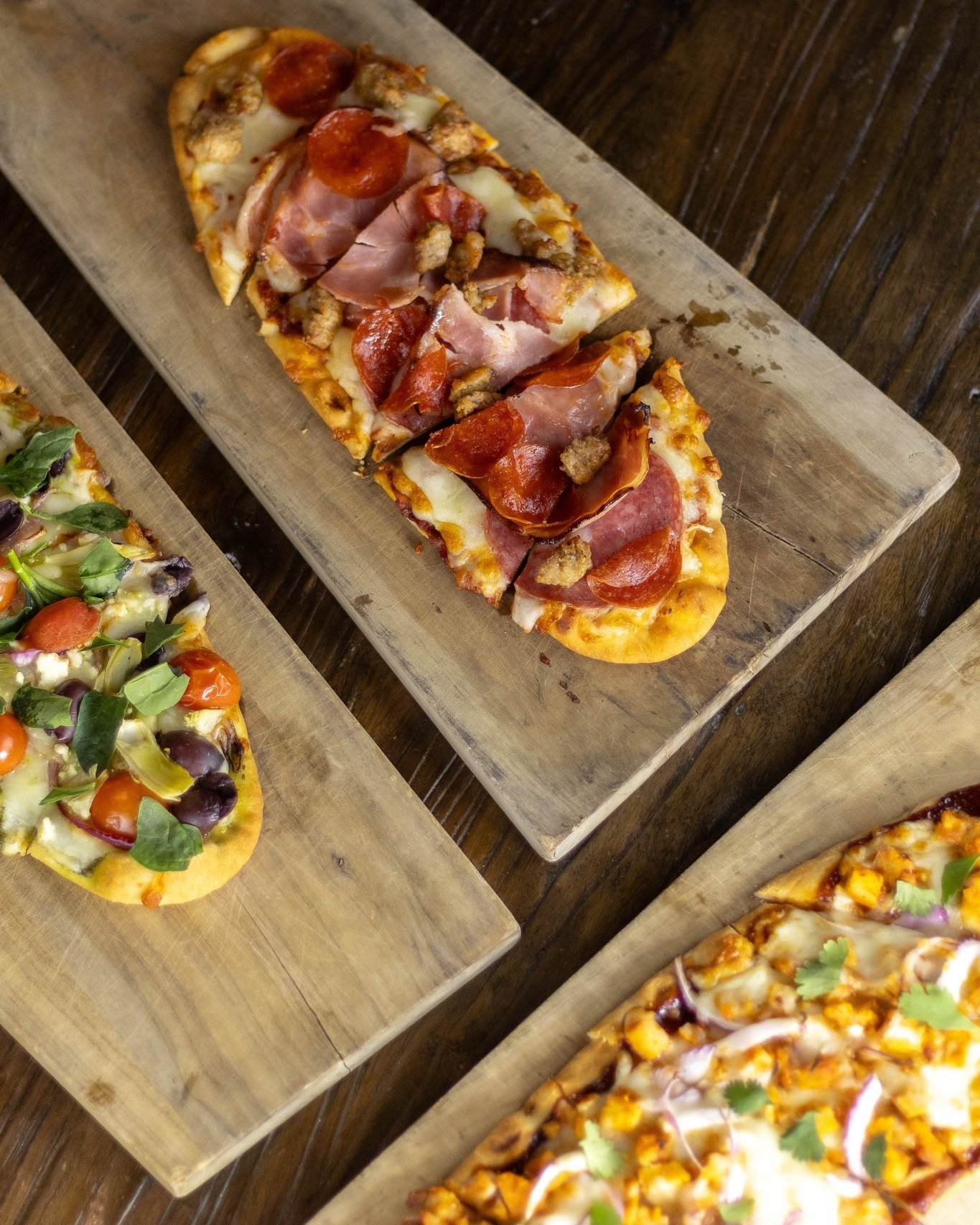 We're rotating a chef's special flatbread &ndash; for a limited time, order the Meat Lover's flatbread with sausage, pepperoni, ham, salami, marinara &amp; cheese. Make sure to try our new mediterranean &amp; BBQ chicken flatbreads too! 🍕