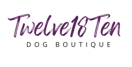 Logo for Twelve18Ten Dog Boutique with purple cursive text and black uppercase text underneath.