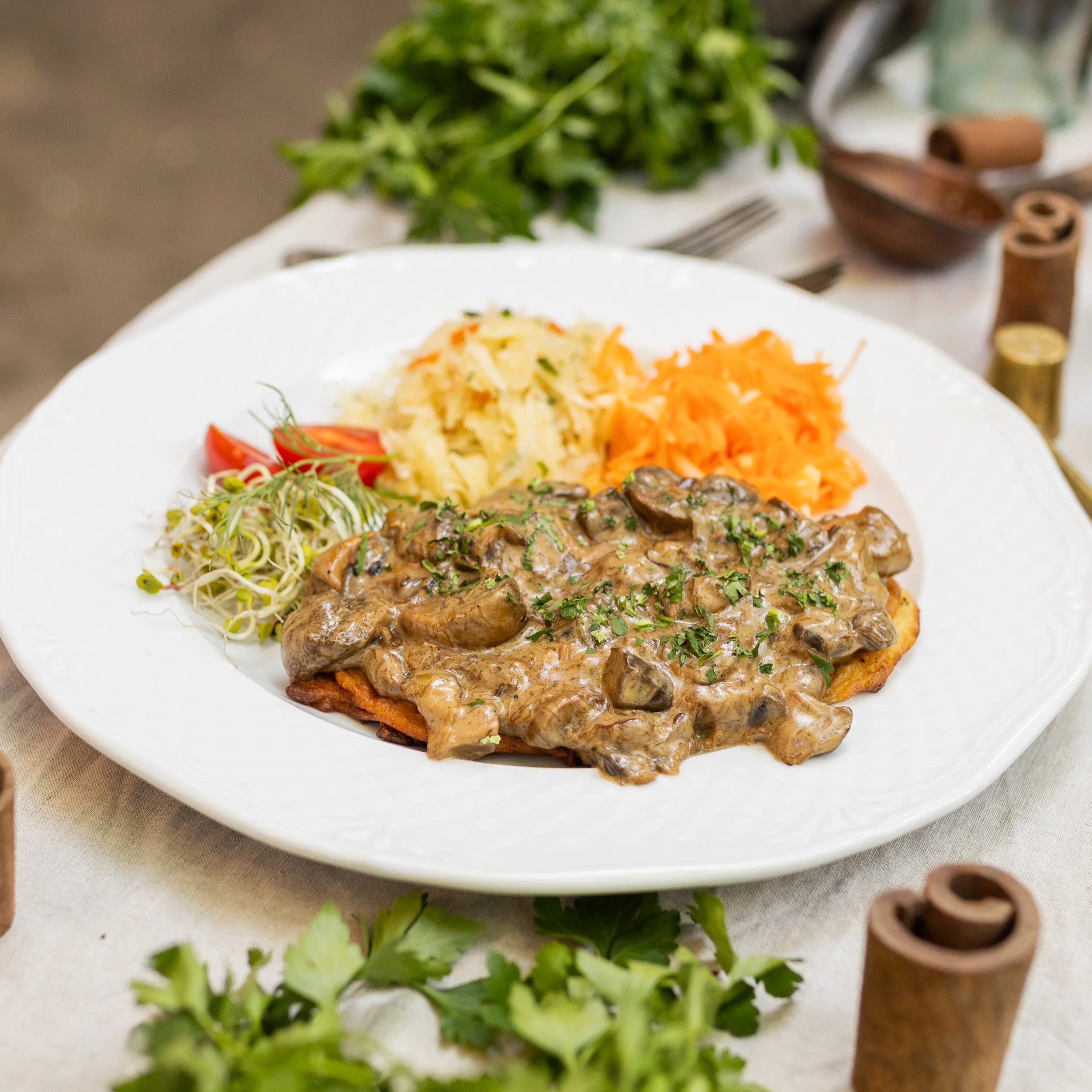 Russian pancake in mushroom sauce