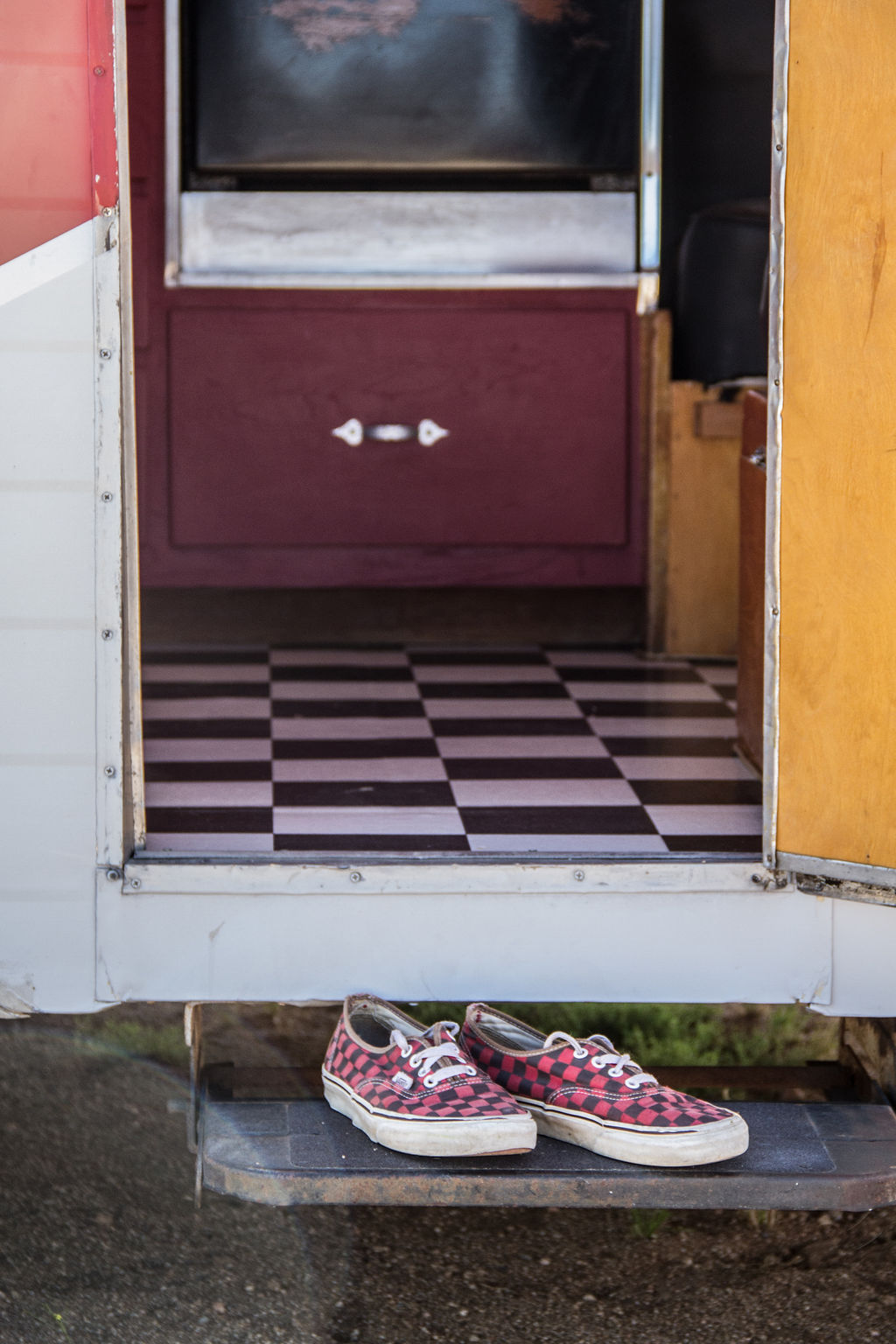 shoes and vintage trailer