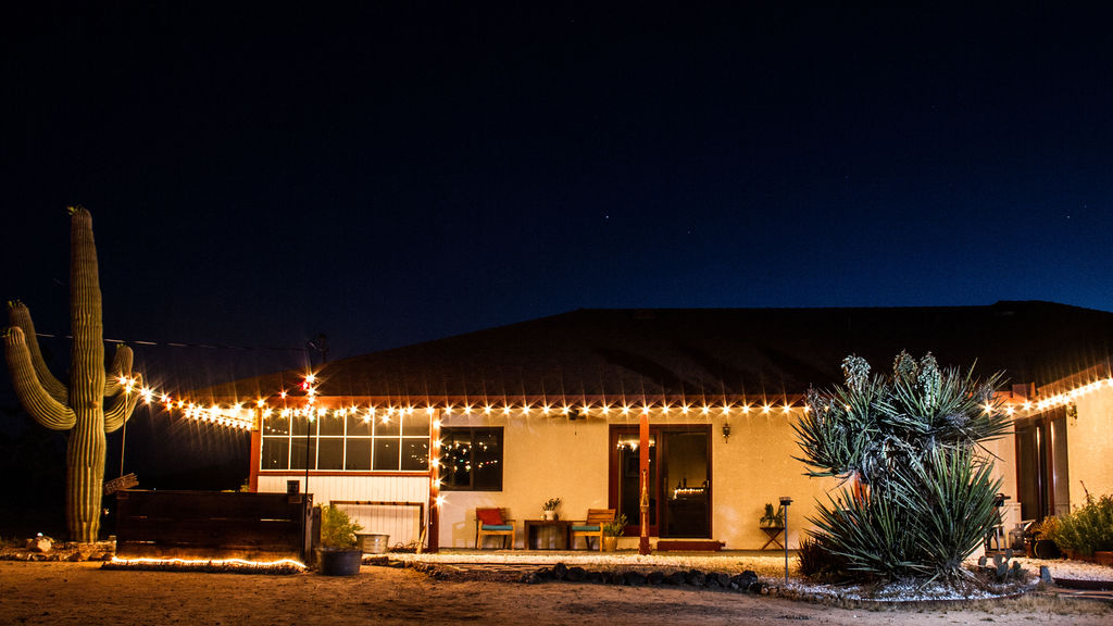 Gatos Trail Ranch with Saguaro Cactus and party lights