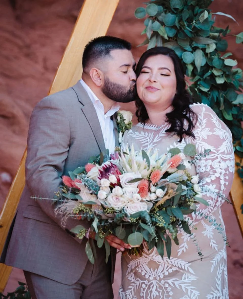 Happy young couple in a Valley of Fire National Monument desert ceremony