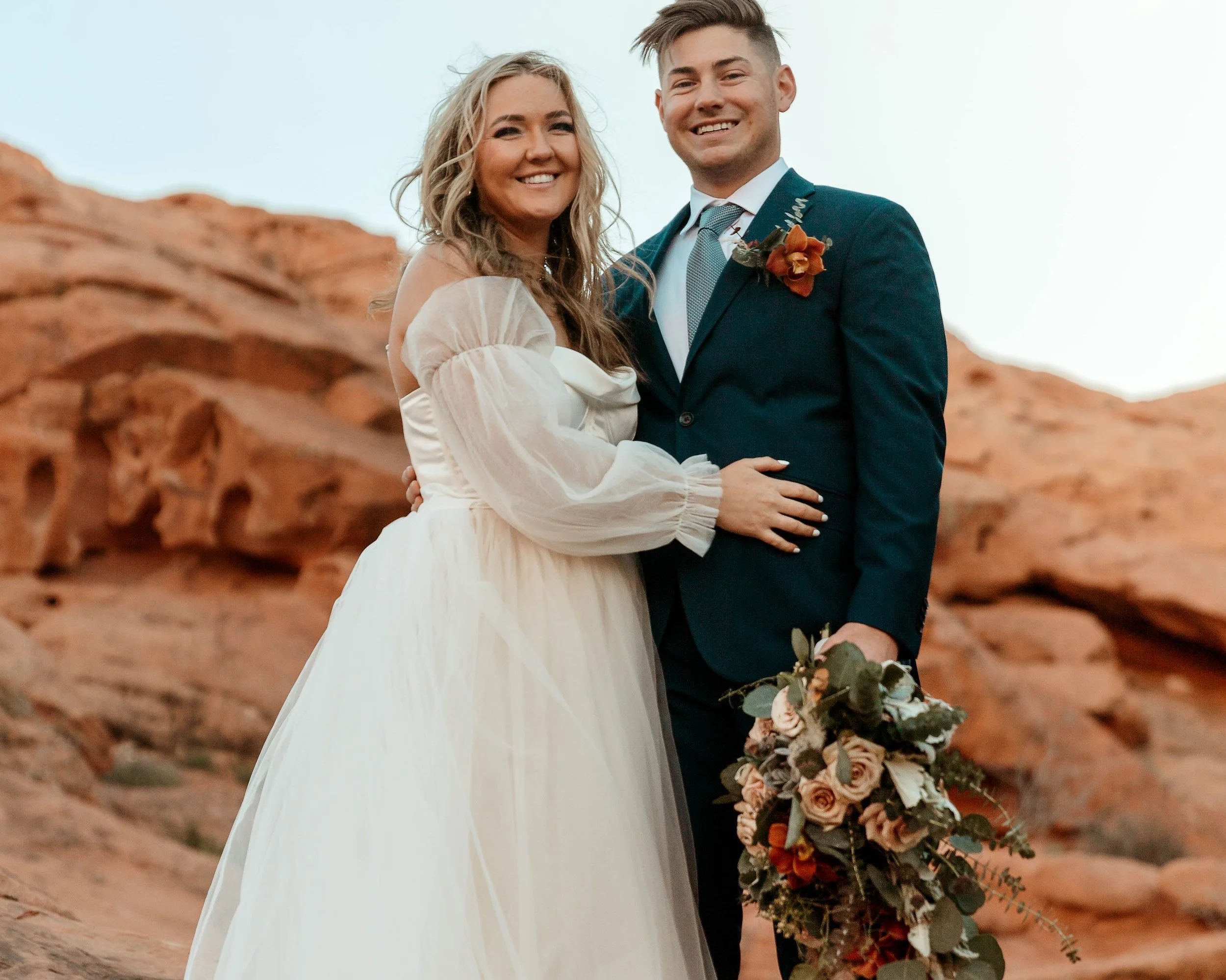 bride and groom in desert colors at Red Rock Canyon