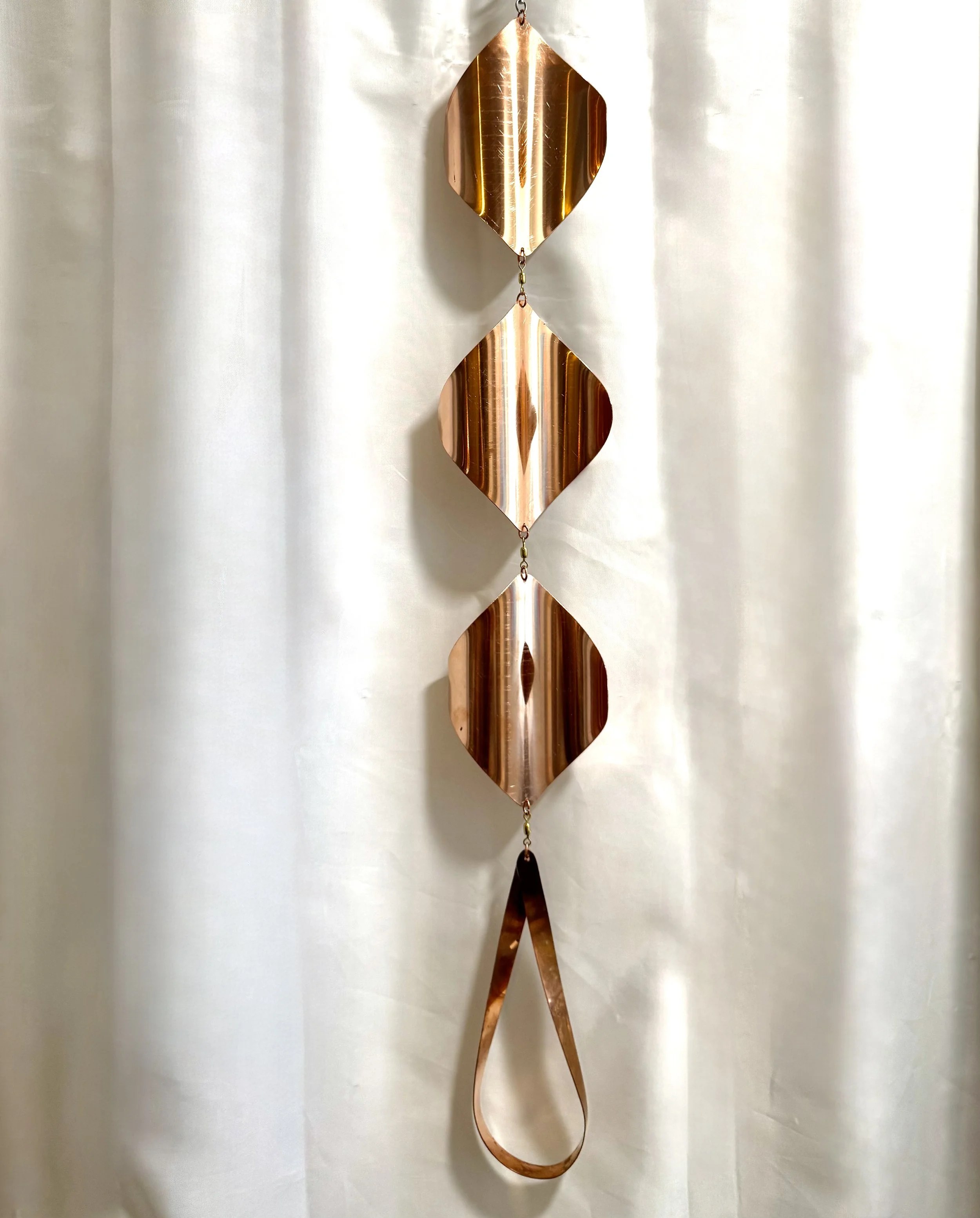 Teardrop copper wind spinner