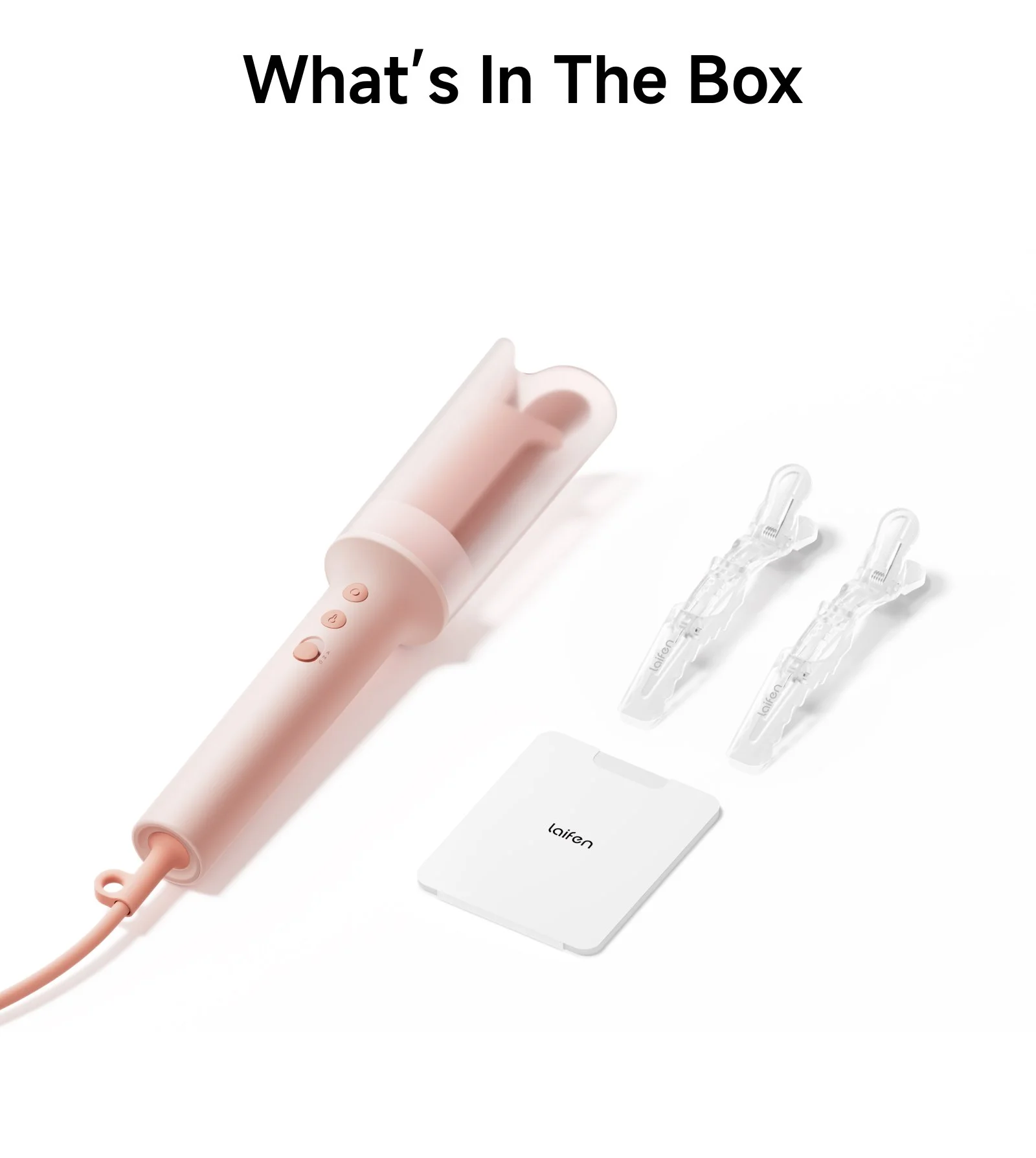 A pink Laifen electric nasal aspirator with a curved nozzle, three control buttons, and some clear replacement tips, along with a white rectangular charger or power bank and a small white remote or control device, all placed on a white surface with the text 'What's In The Box' at the top.