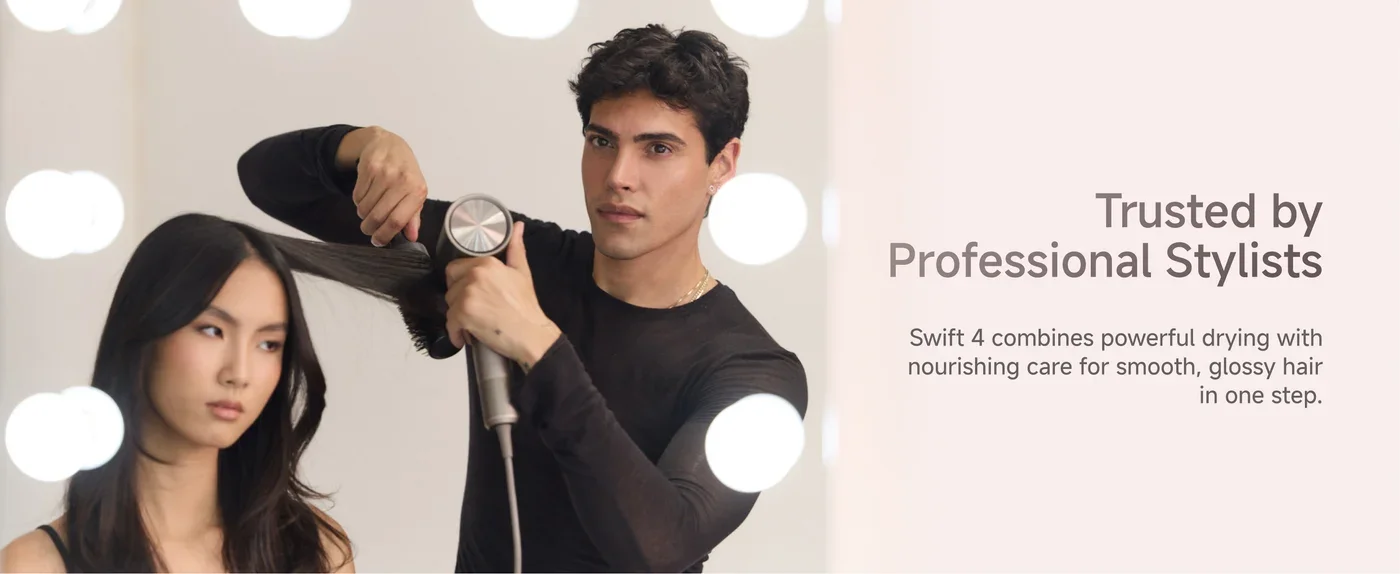A hairstylist drying a woman's hair with a blow dryer in a salon, alongside text that reads 'Trusted by Professional Stylists. Swift 4 combines powerful drying with nourishing care for smooth, glossy hair in one step.'