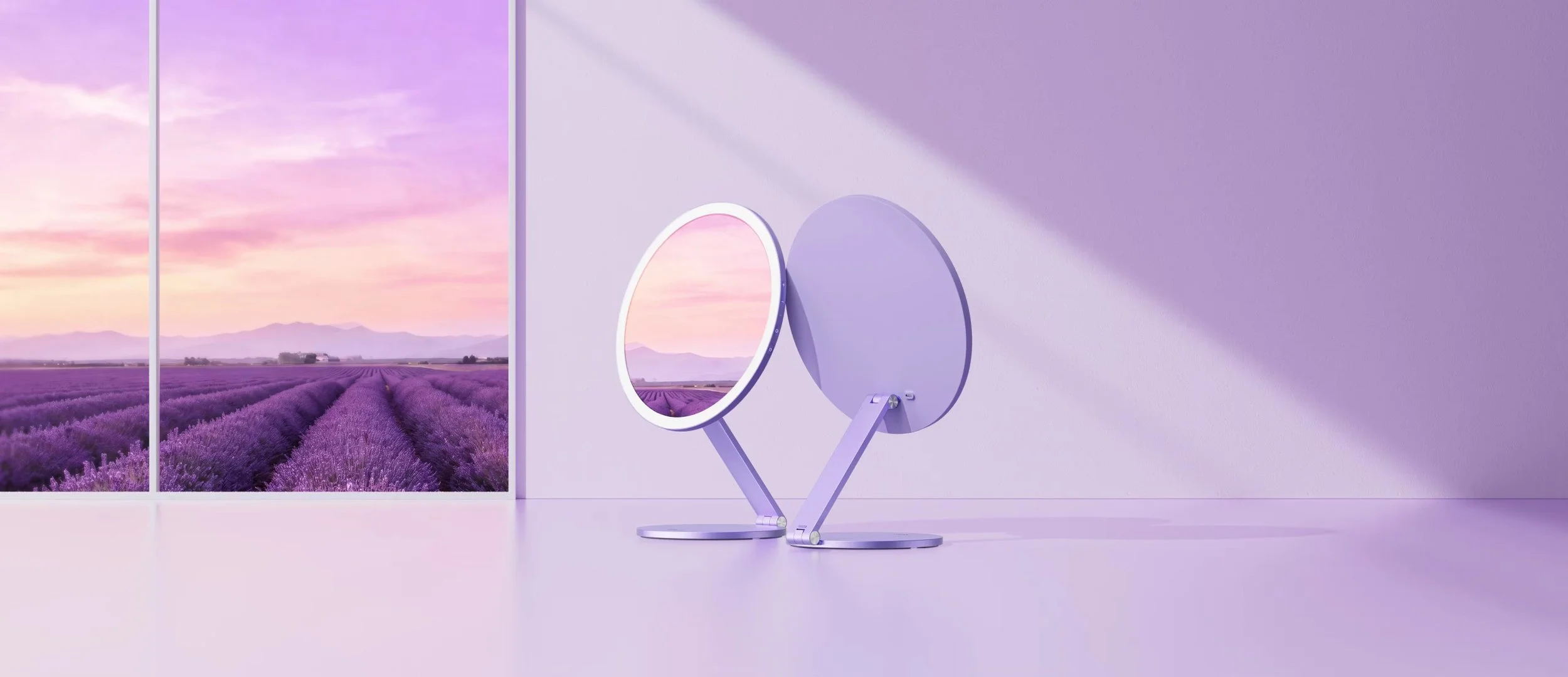 A room with lavender-colored walls and a large window showing a purple lavender field under a pastel sky. Two lavender-colored, round, adjustable mirrors are positioned on a flat surface.