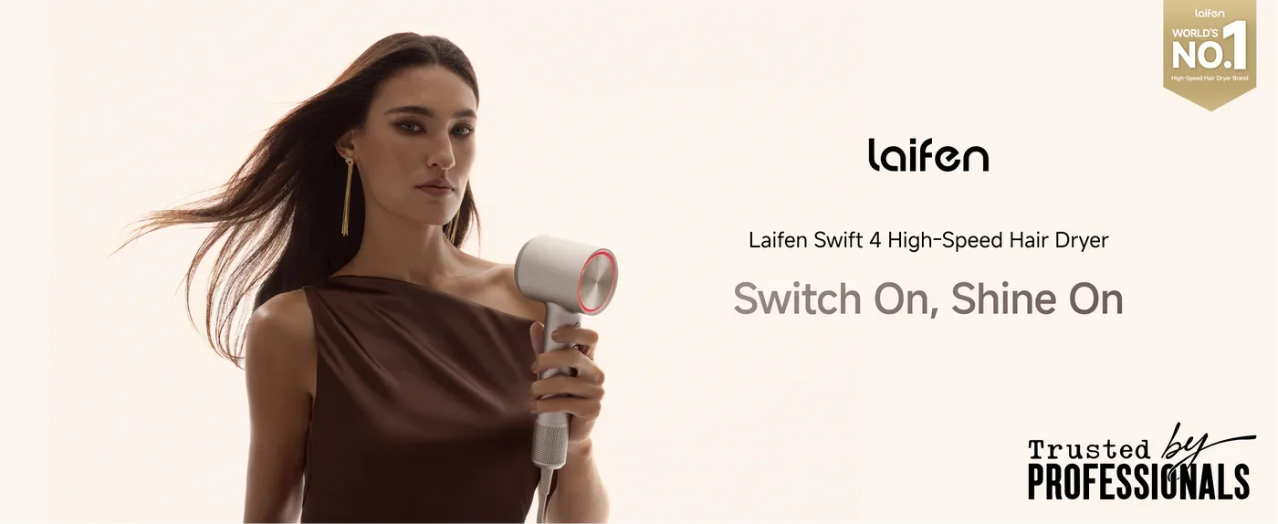 A woman with long brown hair wearing a sleeveless brown top holding a white hair dryer.