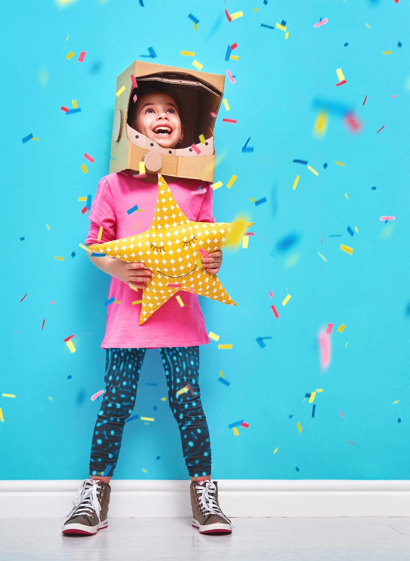 leggings-mockup-of-a-little-girl-with-a-cardboard-helmet-in-a-confetti-rain-setting-34572-r-el2.jpg