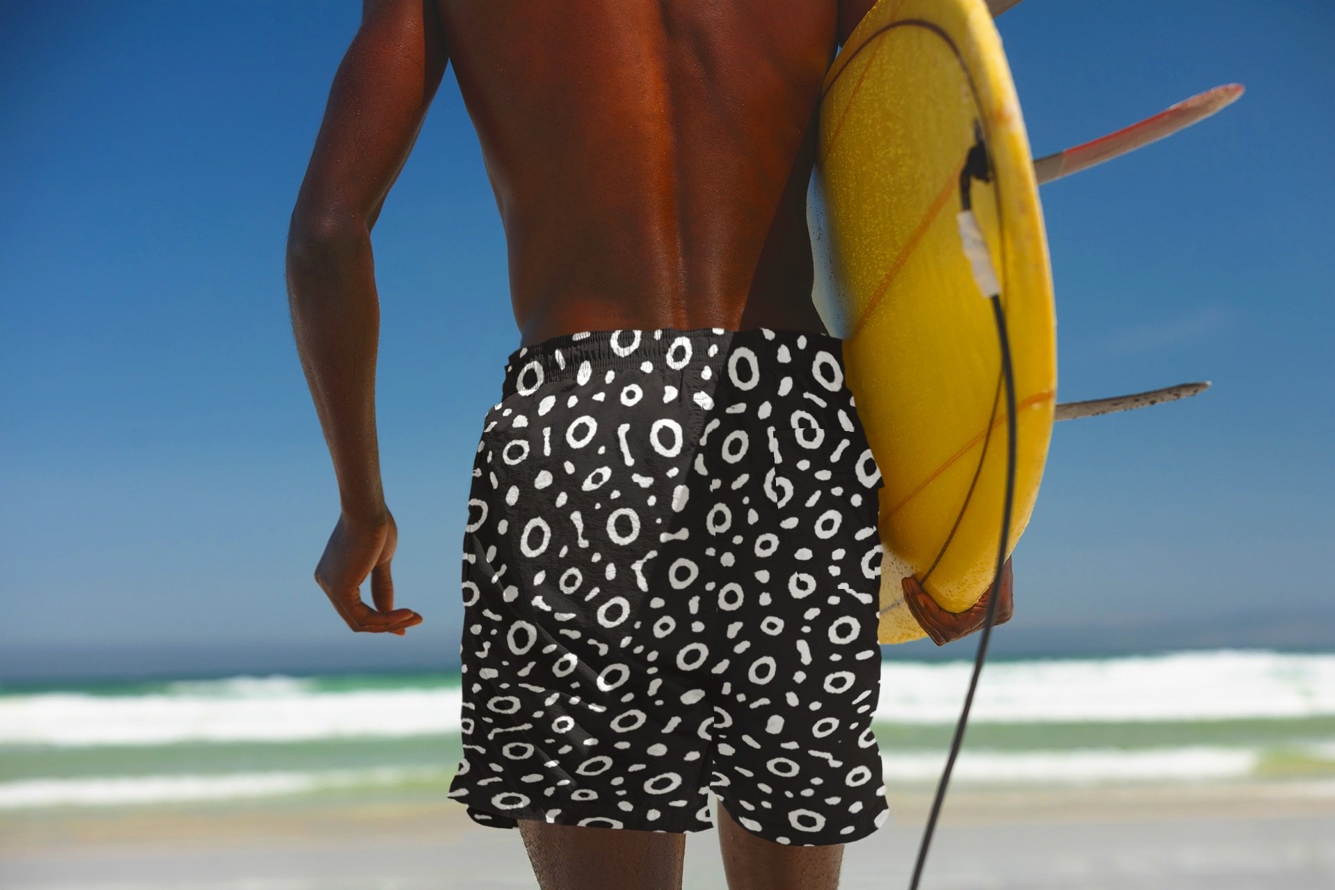 back-view-swim-trunks-mockup-of-a-surfer-at-the-beach-40979-r-el2.jpg