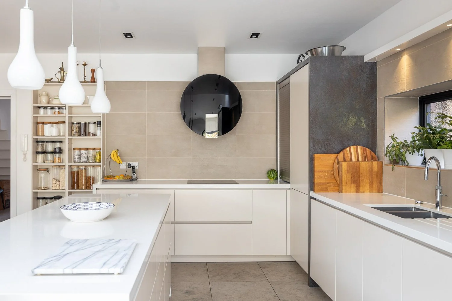 Contemporary slate and white kitchen with induction cook top