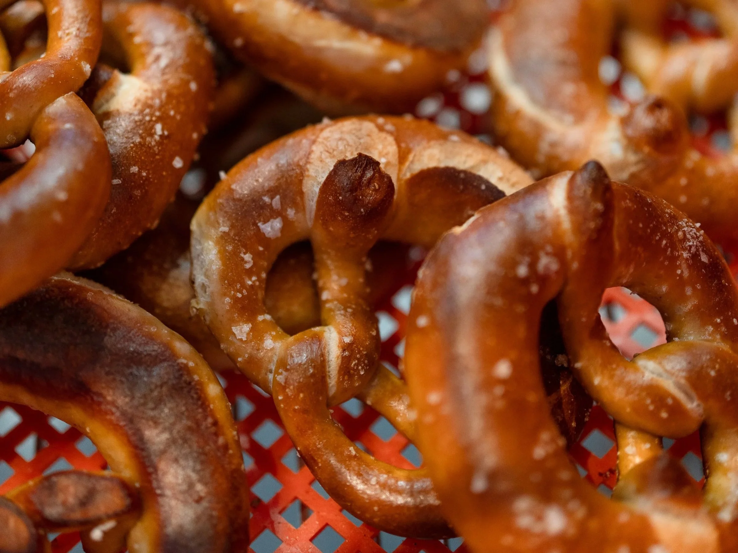 A crate full of freshly baked authentic german pretzels