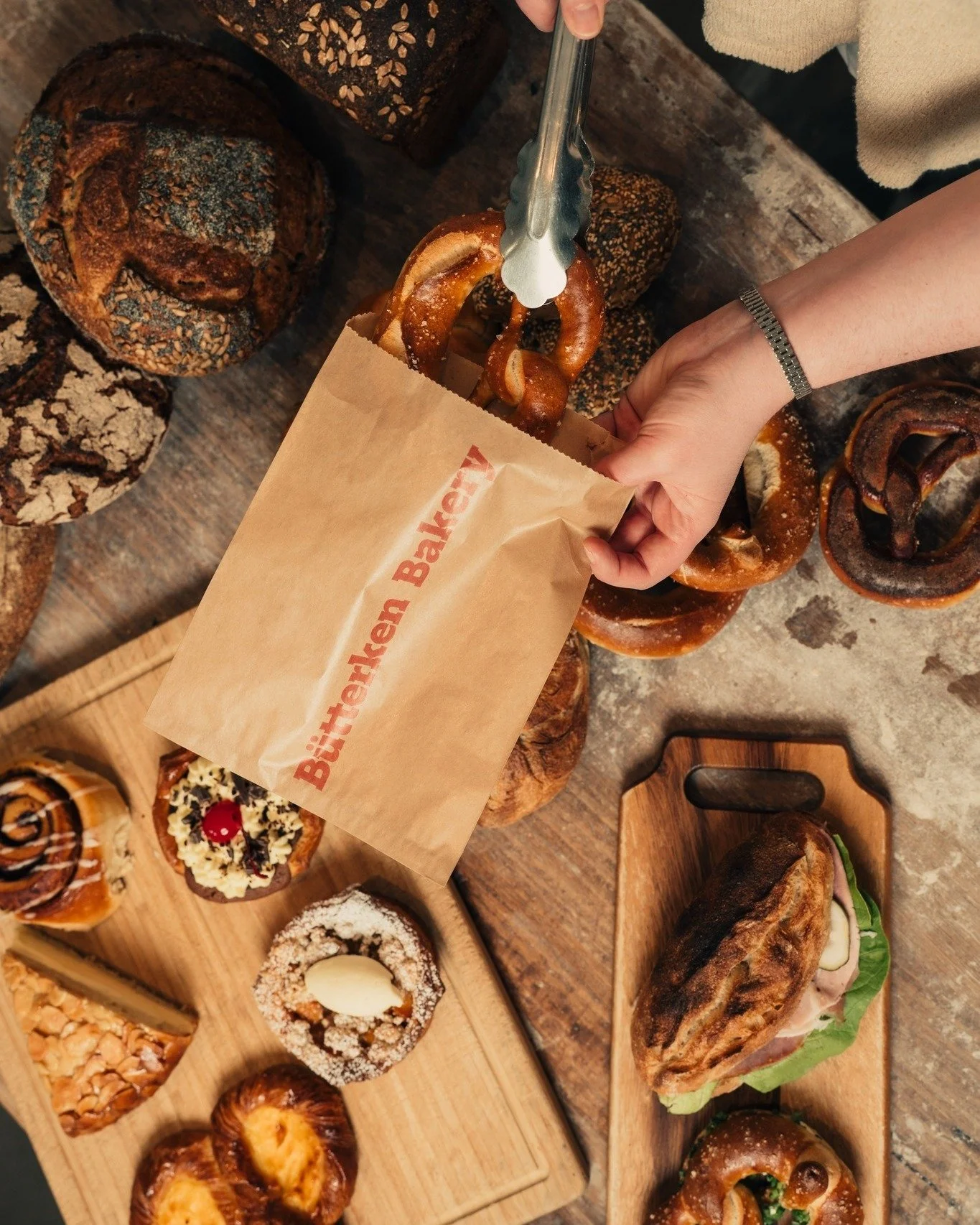 This is Butterken Bakery 🥨

We're a German-style bakery in Mount Eliza making bread, pretzels and sweets, from scratch, every single day.

Walk past and you'll see our bakers through glass walls, hands in dough, twisting pretzels one by one. We buil