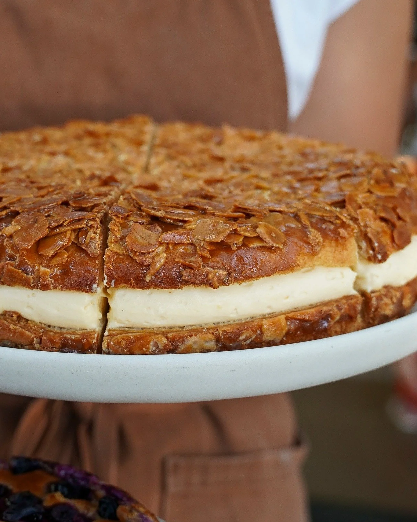 Here's the thing about Mother's Day 🤔

Everyone's scrambling for the perfect gift, the perfect gesture, the thing that says "I really put thought into this."

May we suggest...a whole Beesting cake!

Our Bienenstich has become the cake peo