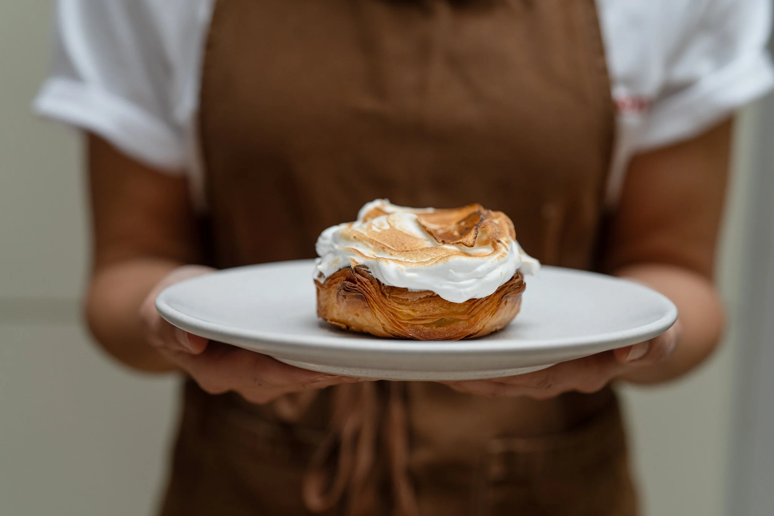 Butterken Bakery Rhubarb Meringue Cross section whole on a plate