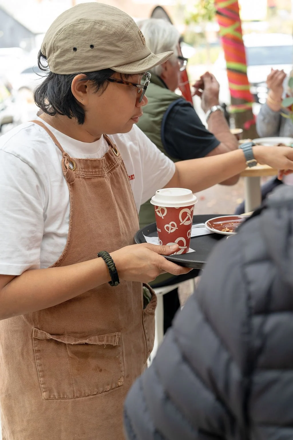 Woman serving coffee