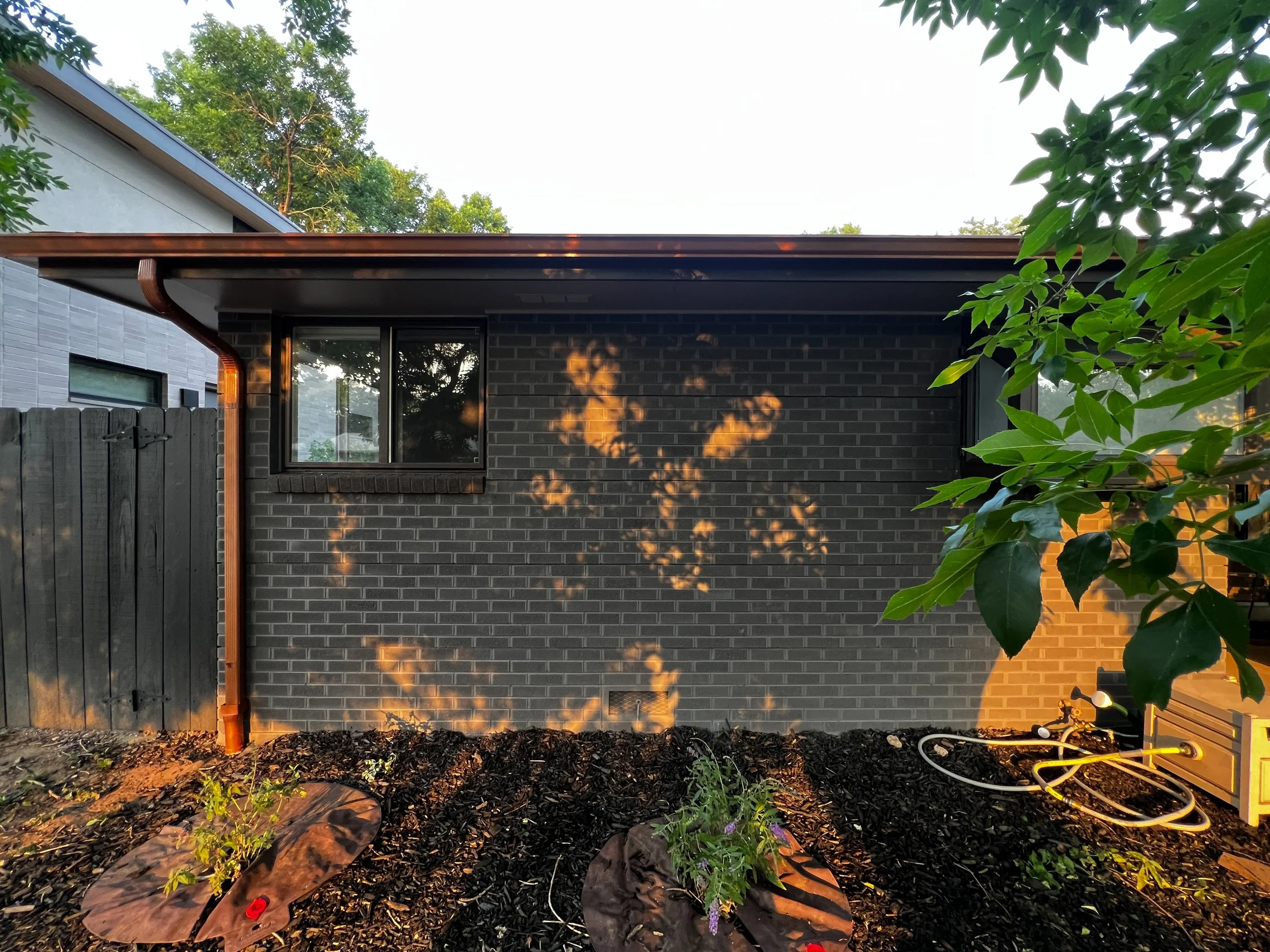 Denver Brick Staining | New Perspective Painting