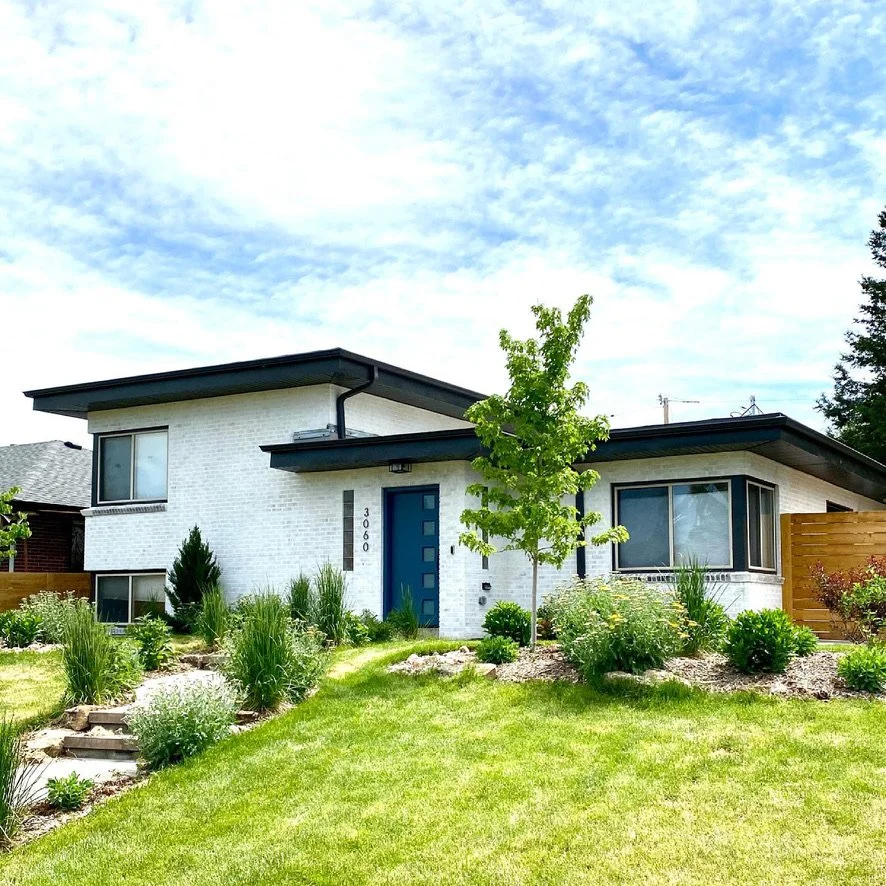 Exterior painted home in Denver Colorado with painted brick and painted siding by New Perspective Painting