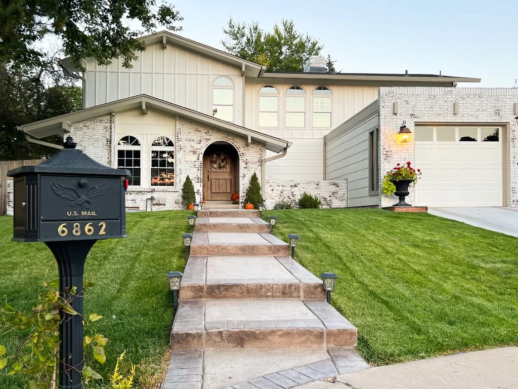 Limewash brick exterior home with Romabio Limewash paint in Denver Colorado
