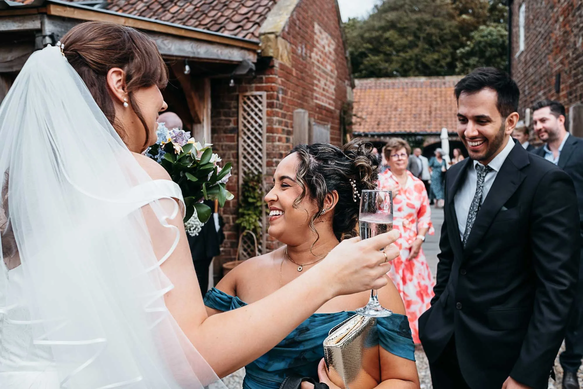 Aimee hugging a guest outside just after the ceremony