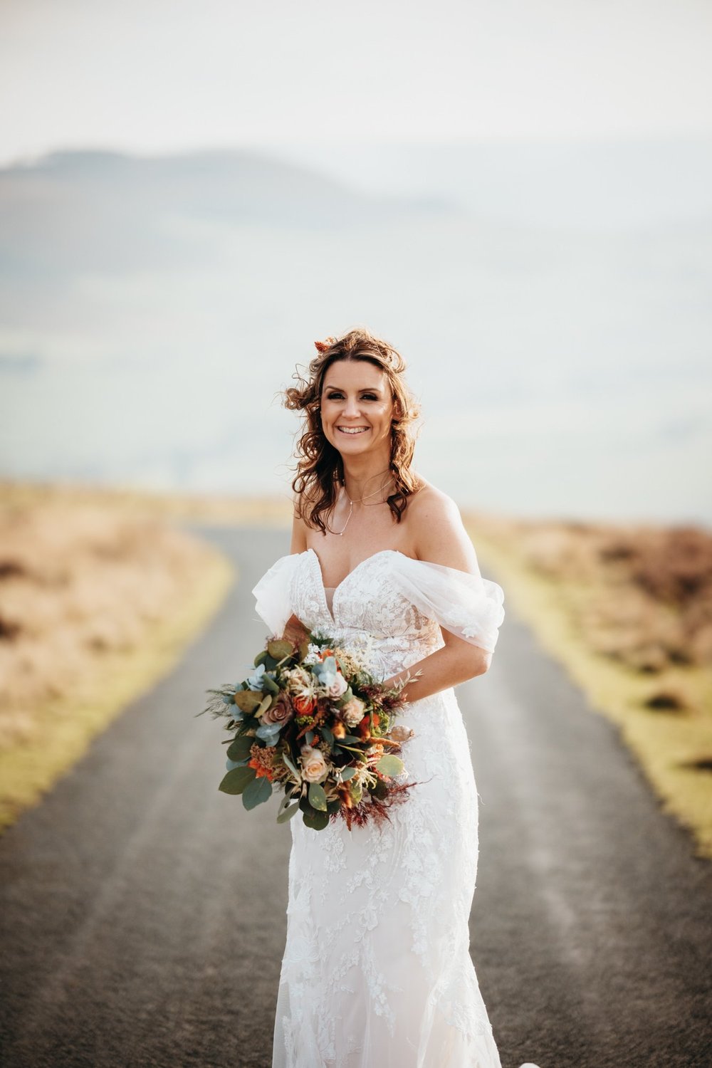 Wedding couple photographed on the bronze autumn moorland near Danby Castle