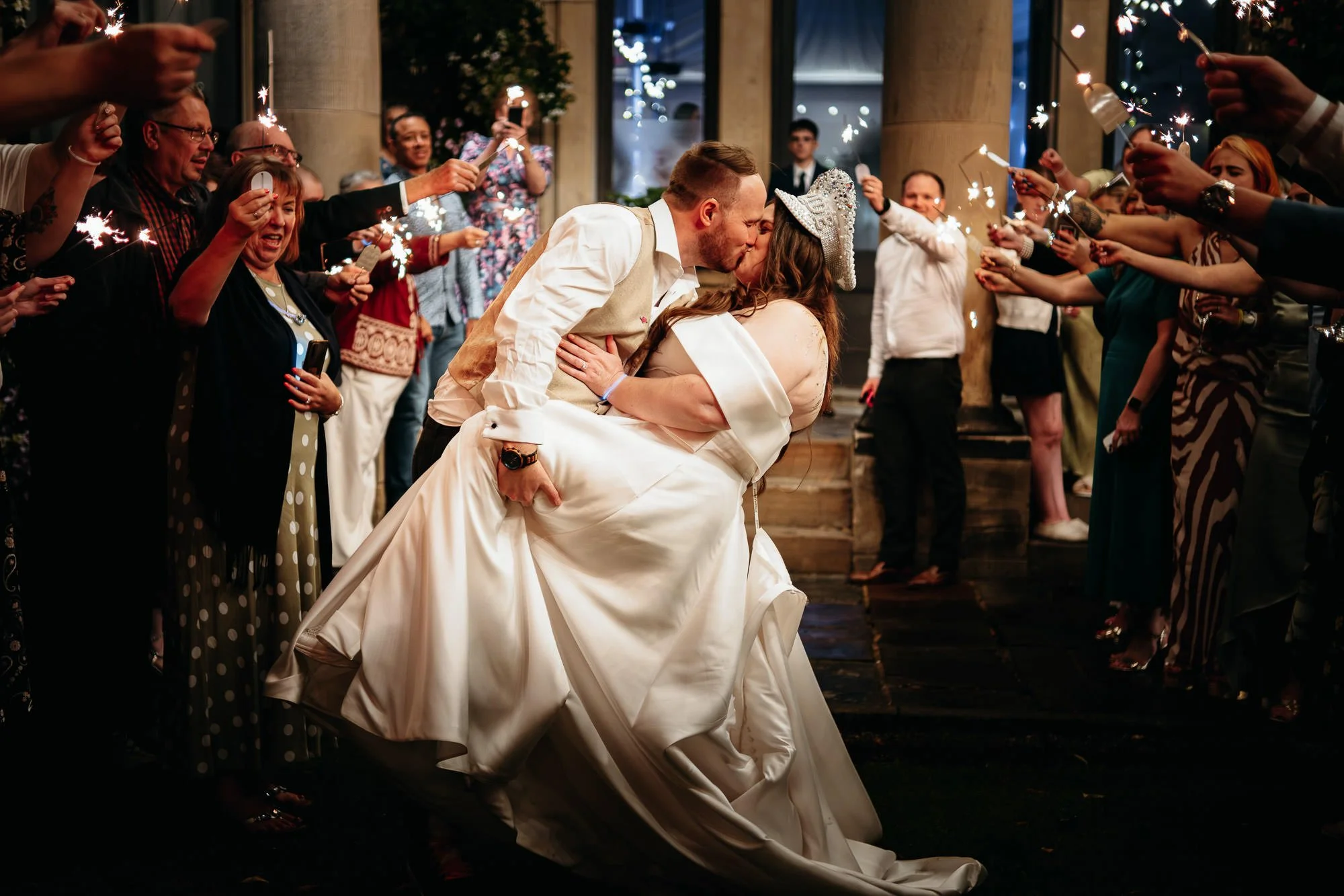 bride and groom kiss during Confetti photo