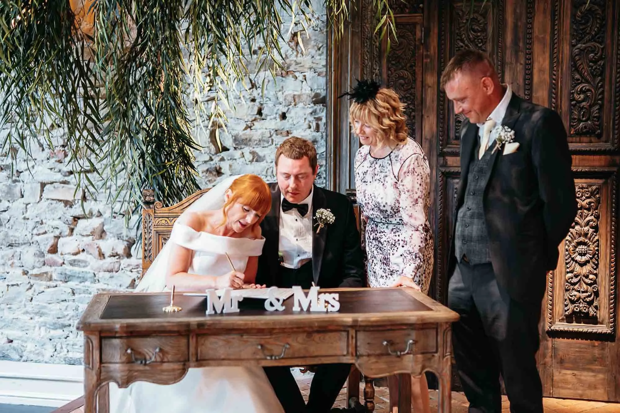 Couple during their autumn ceremony at The Croft Hotel near Darlington, lit by warm lamp light
