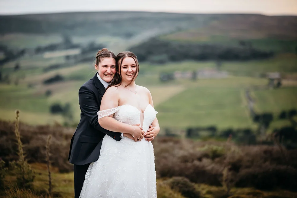 Wedding couple on the open moorland above Danby Castle in the North York Moors