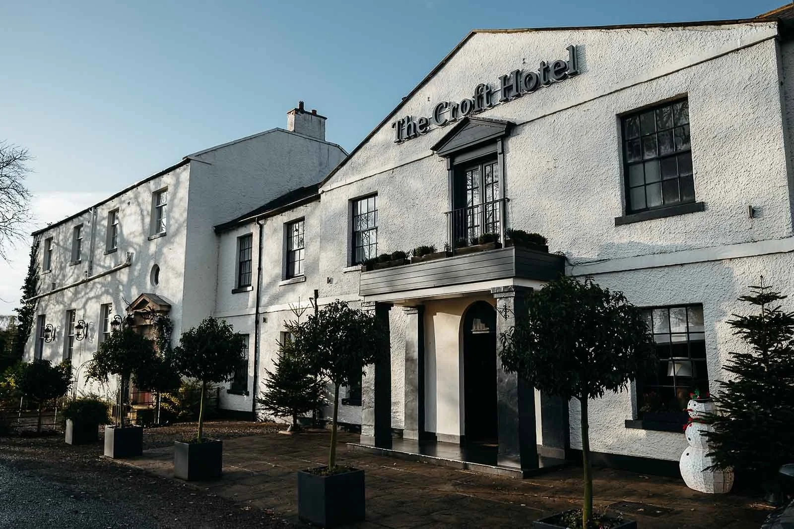 The white Georgian frontage of The Croft Hotel at Croft-on-Tees on a clear winter morning