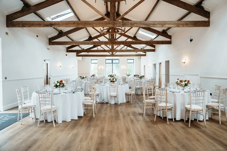 Daleview Barn at Danby Castle laid out for a wedding breakfast