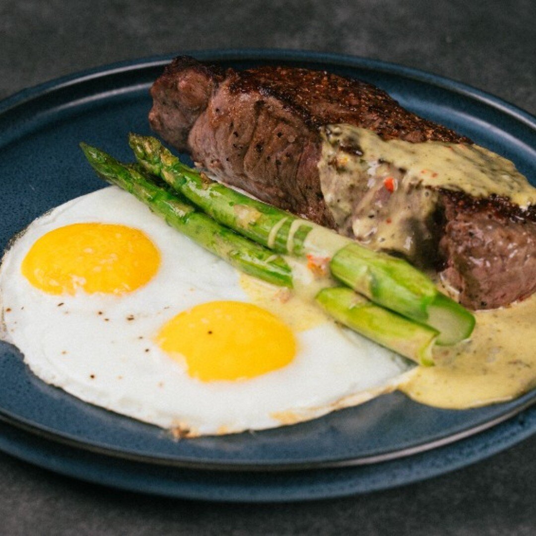 March Madness Final Four is HERE!

Come by today to catch the game and enjoy this 12 oz grilled ribeye with two sunny side eggs, roasted asparagus, and chimichurri hollandaise sauce. The Heifer and Hens is our take on the classic Steak and Eggs combo