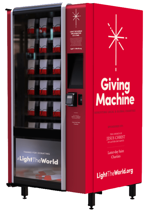 Una máquina expendedora en la que se seleccionan y compran artículos necesarios ofrecidos a organizaciones benéficas locales.
