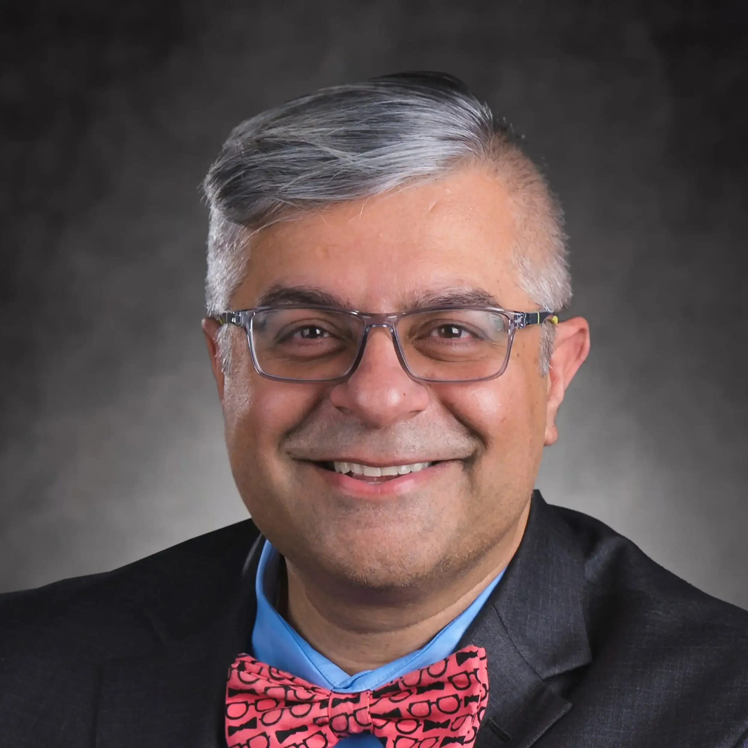 A headshot of Amit Taneja