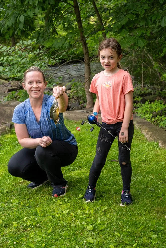 Shanna shows off Olivia's fish.