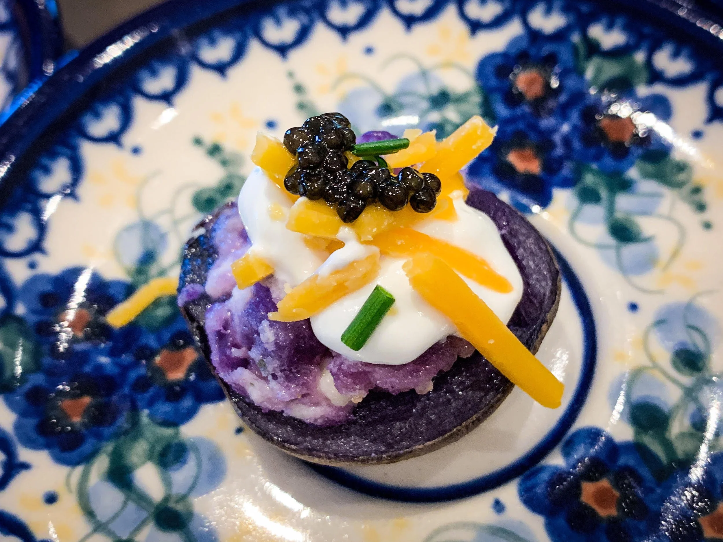 Capo Creek caviar kissed blue potatoes.jpg