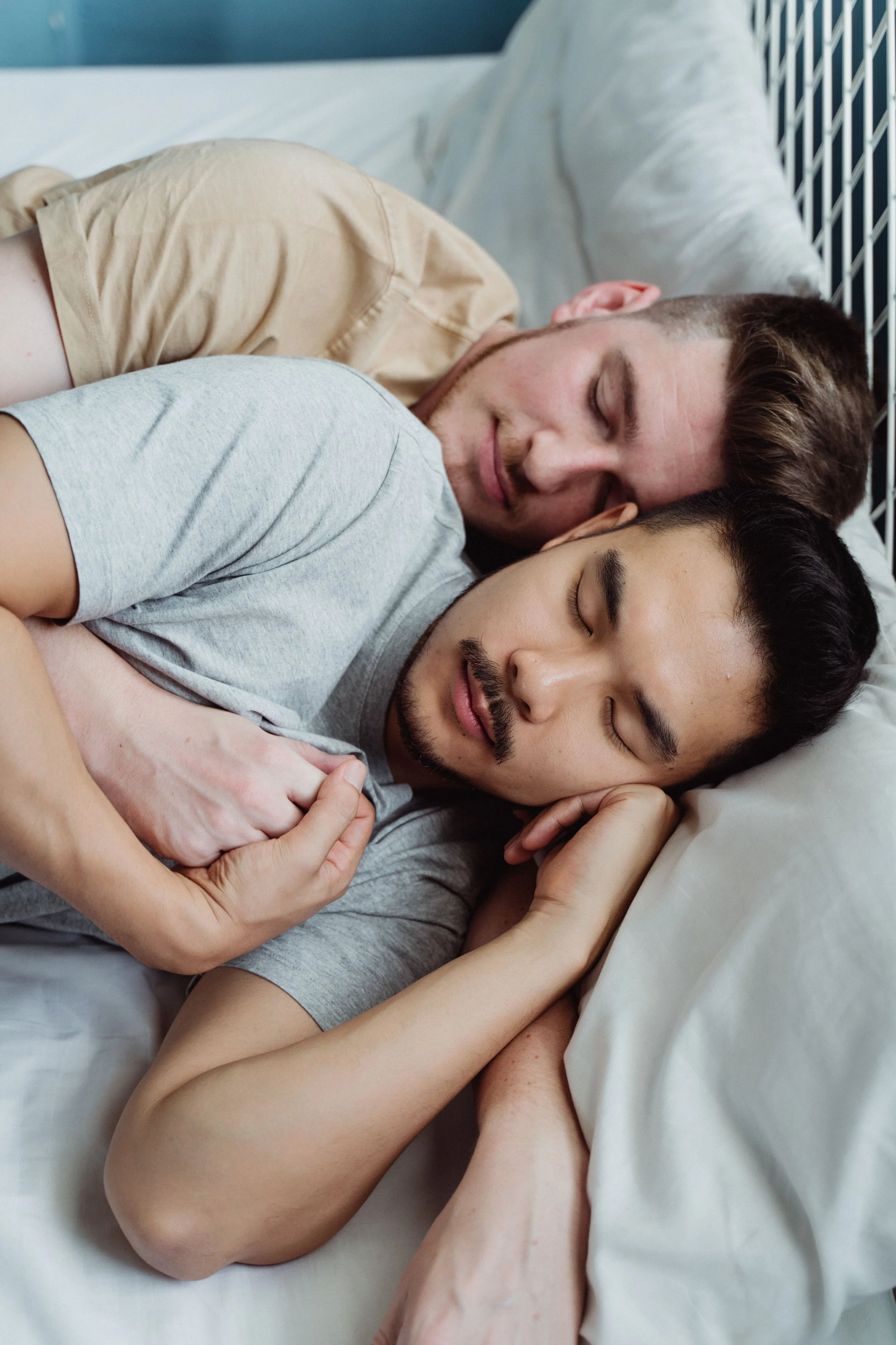 Two people sharing a safe, professional, platonic cuddle in a comfortable setting