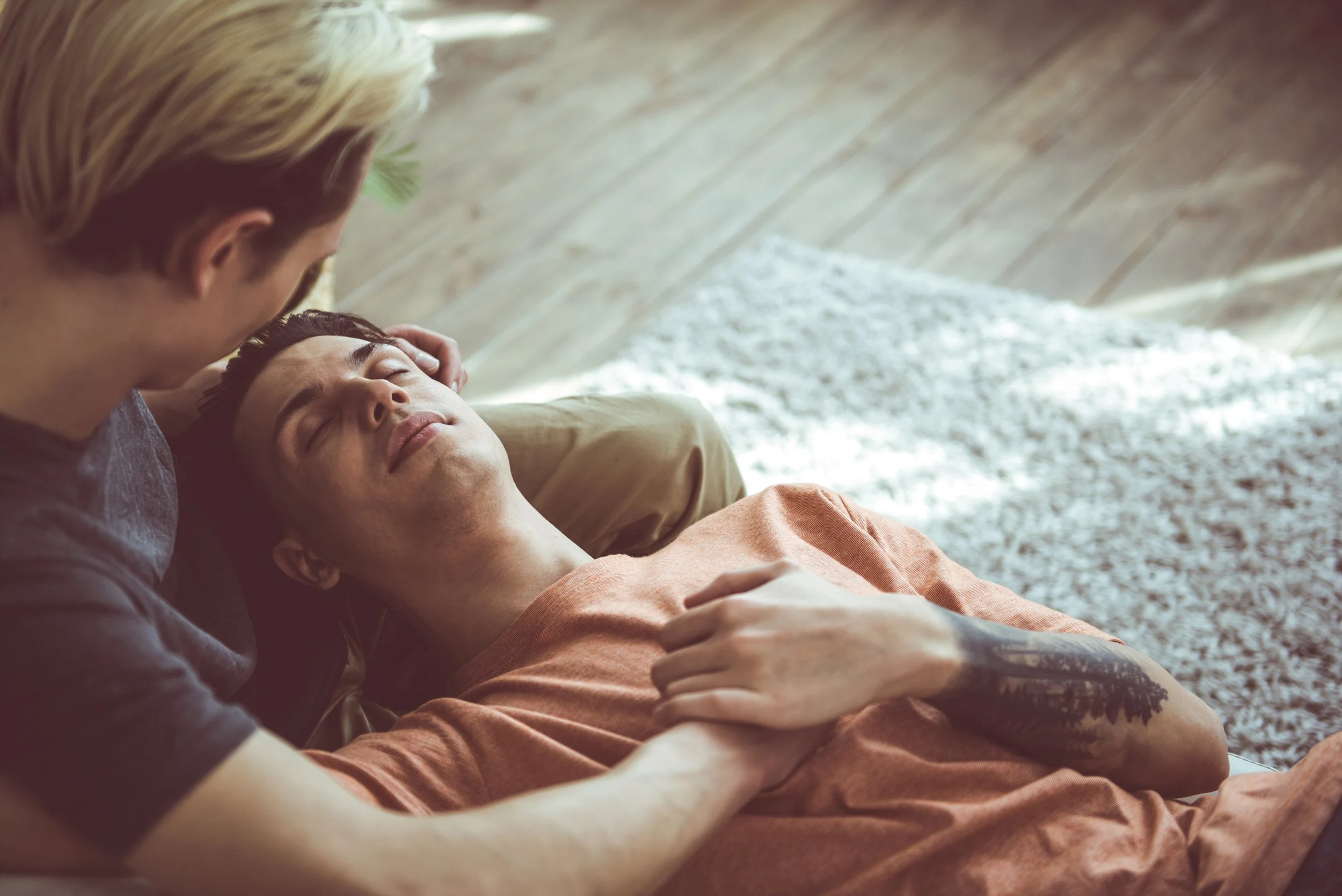 Trevor James providing compassionate support during a wellness and emotional healing session, promoting mental health, holistic wellness, mindfulness, and personal growth.
