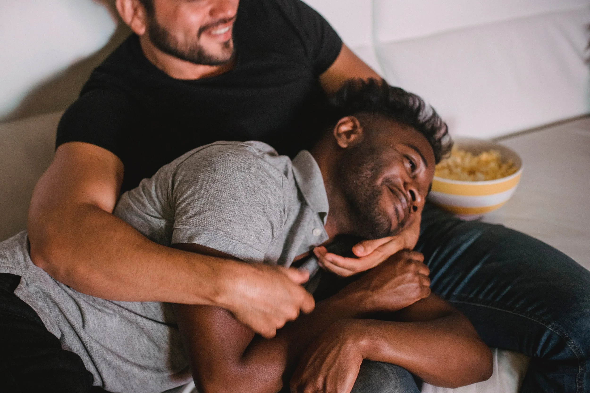 Trevor James offering cuddle companionship while watching movies and TV in a comfortable home environment.