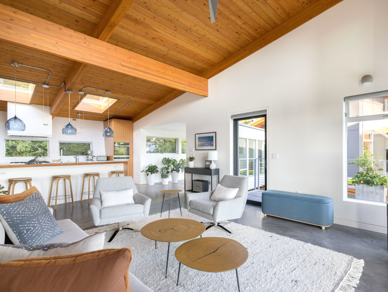 There are literally no bad angles in here, beautiful kitchen in one direction &amp; stunning coastal views in the other! 

The pallette is similar to what you'll see outside, natural wood, pops of blue and grey! What do you think?

(This lovely firep