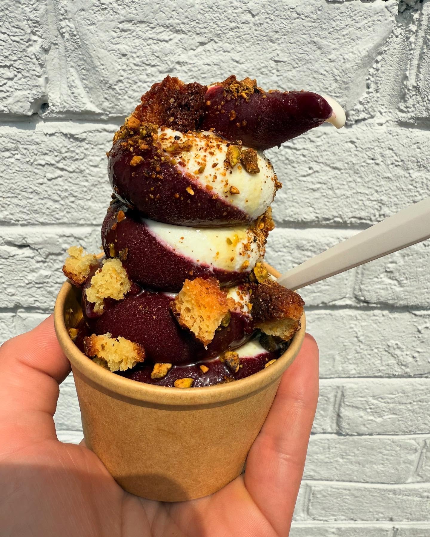 New swirl day here at Salita Pizza.  Keeping those summer flavors going.  Always real ingredients, always real delicious.

Greek FroYo and Blueberry swirl - olive oil, sea salt, toasted olive oil cake, pistachio