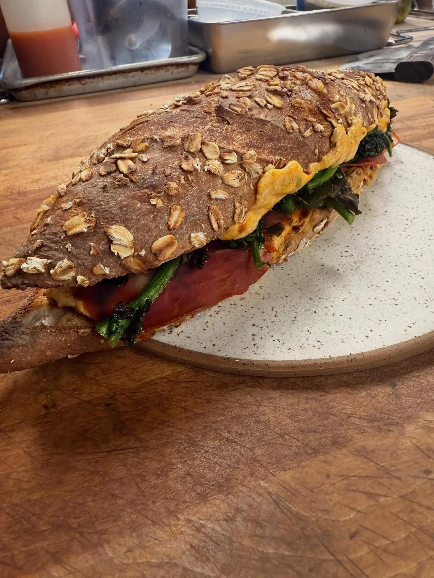 Horrible picture of a great sandwich.  I got nervous because @jakecortez_tattoos was watching me and he looked hungry.  I hope he enjoyed this one.  A warm hearty sandwich for a cold rainy day.  Limited quantity, walk ups only.  We also have soup and