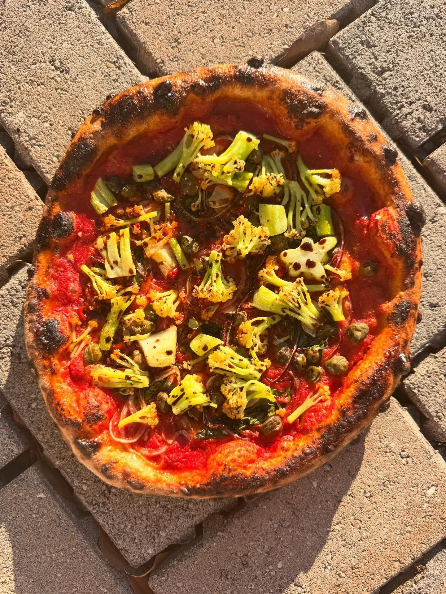 New vegan pie we put on a couple of weeks ago.  This is one of our favorites right now.  A little twist on some classic flavor pairings, it hits all the marks, a little earthy, little spicy, little salty, little tart, little sweet.  Perfect canvas to