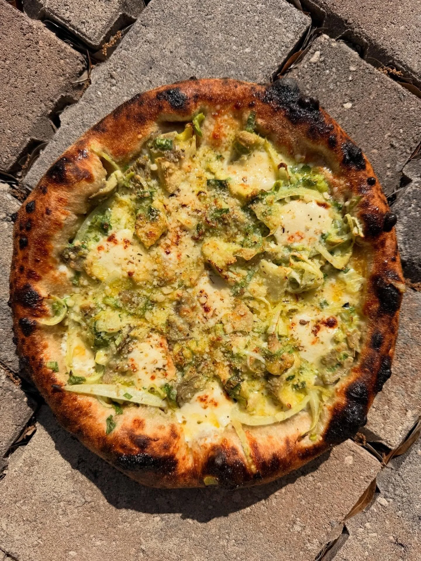 New shroom pie, same old salita.  Gave this one a little spring makeover.  Probably not here for a long time, so get it while you can.

Mushroom - green garlic cream, smoked mozz, spring onion, sweet onion