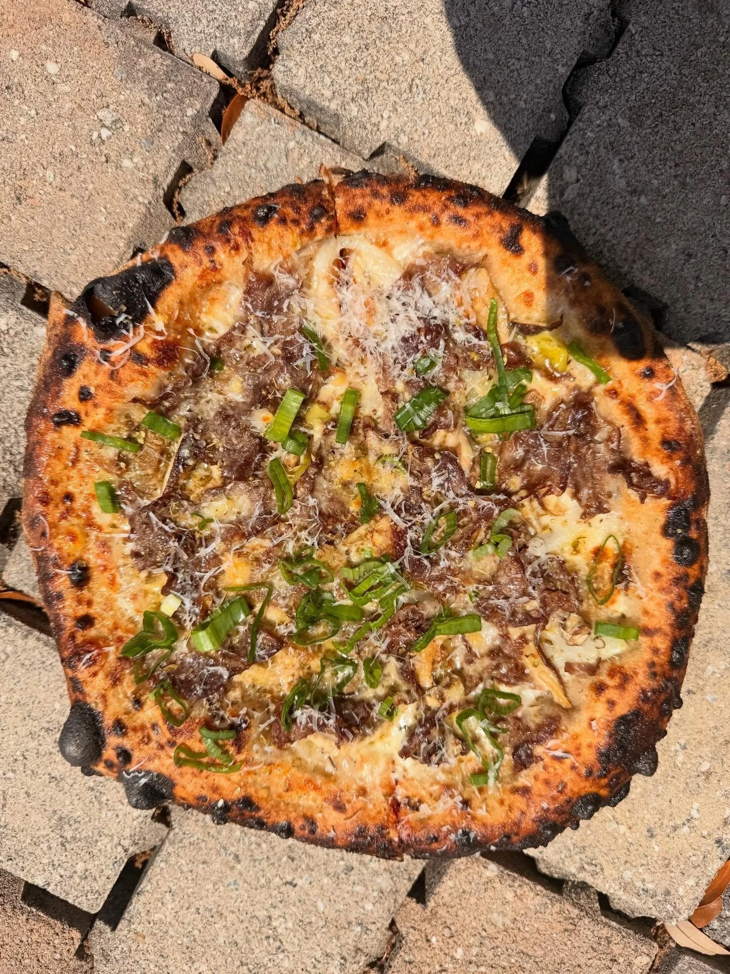 Some not great pictures of a really great pizza.  Limited run on a @paintedhillsnaturalbeef steak and cheese, get it before you can&rsquo;t.

Steak and Cheese - garlic cream, Comte, shaved ribeye, mushroom, sweet onion, pickled pepper