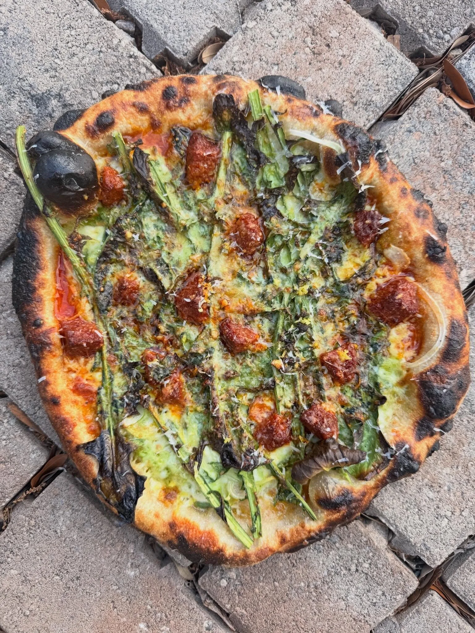 Dandelion pizza with sobrasada, it&rsquo;s what for dinner.

Dandelion - green garlic, 3 cheese, garlic, onion, sobrasada, lemon zest